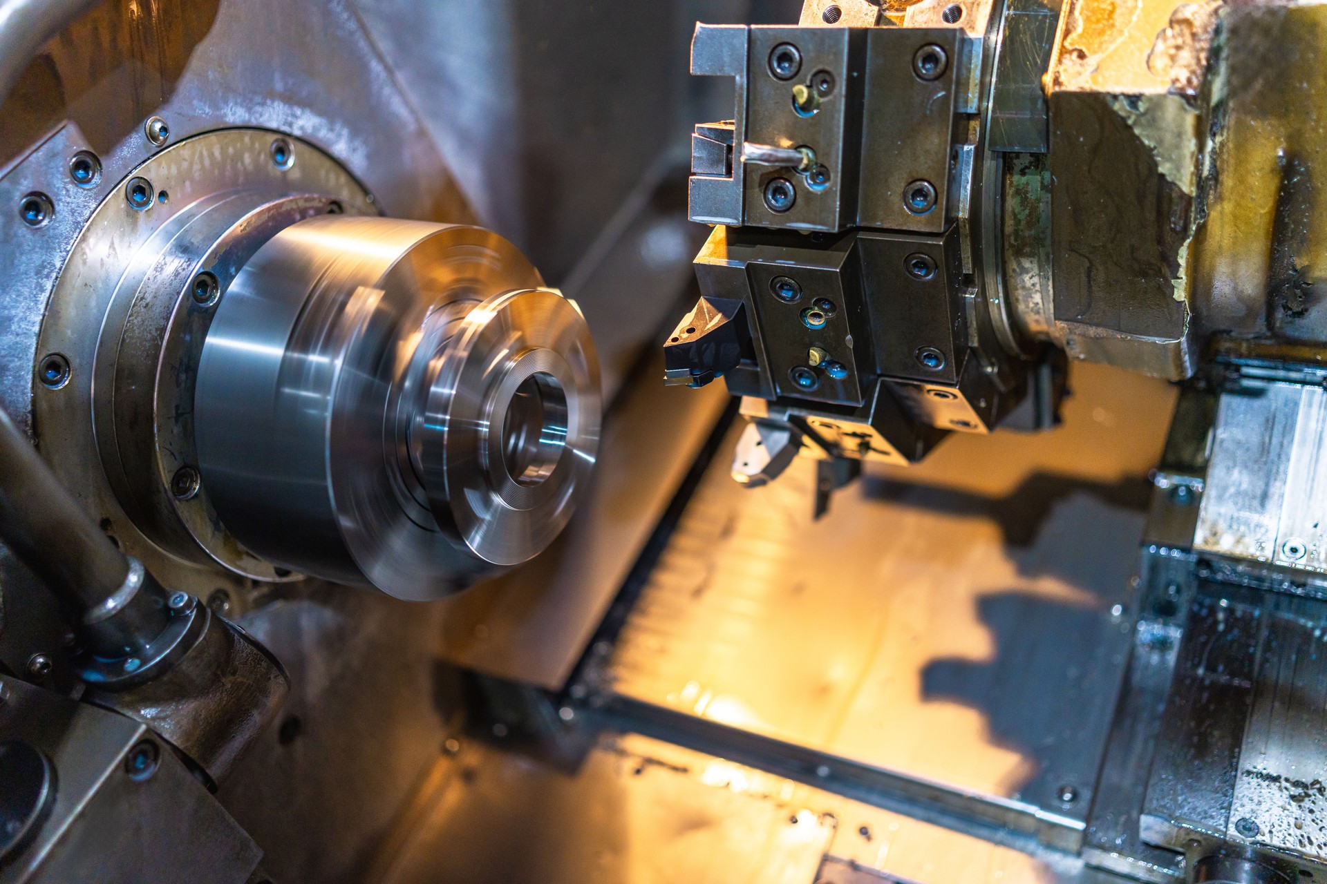 Close-up of an industrial lathe in a cnc factory